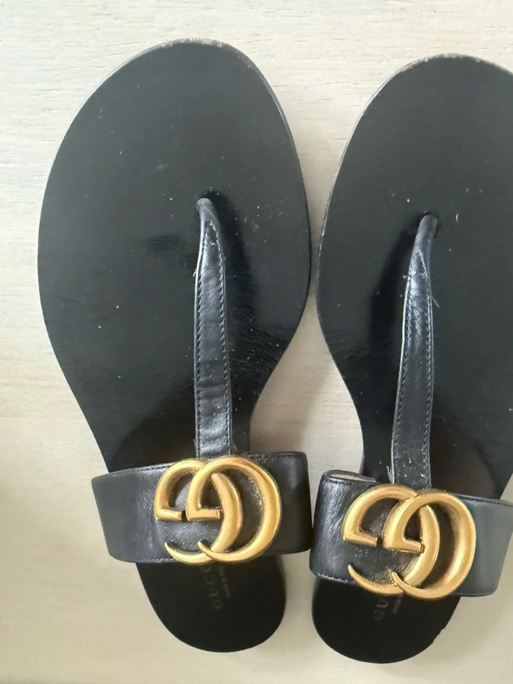 Authentic Gucci Black Leather GG Gold-Logo Thong Sandals